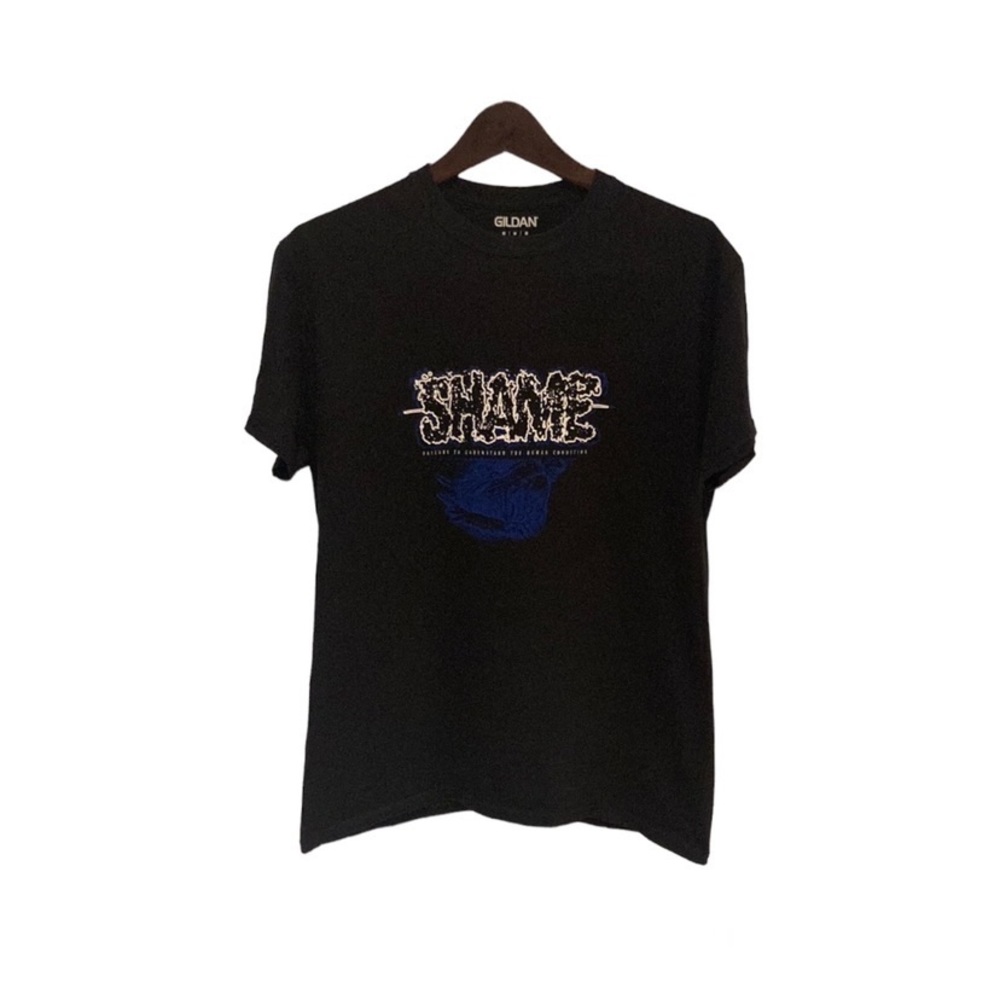 “SHAME, FAILURE TO UNDERSTAND THE HUMAN CONDITION” Printed T-Shirt